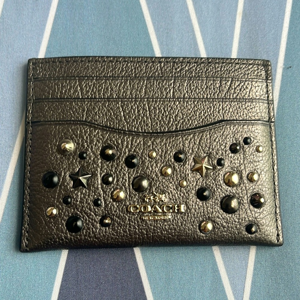 Coach Outlet Slim Id Card Case with the signature logo of Coach New York